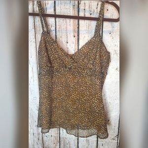 Cheetah print cami with adjustable straps. Slightly worm. Smoke-free home.